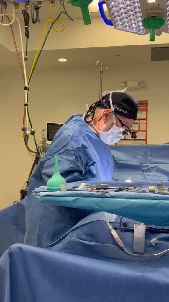 Dr. Mark Solomon performing surgery in an accredited operating room